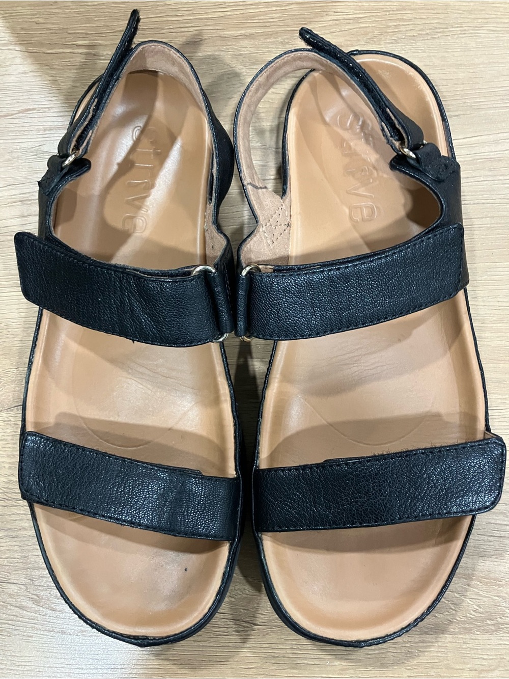 Strive women’s black leather strappy sandals